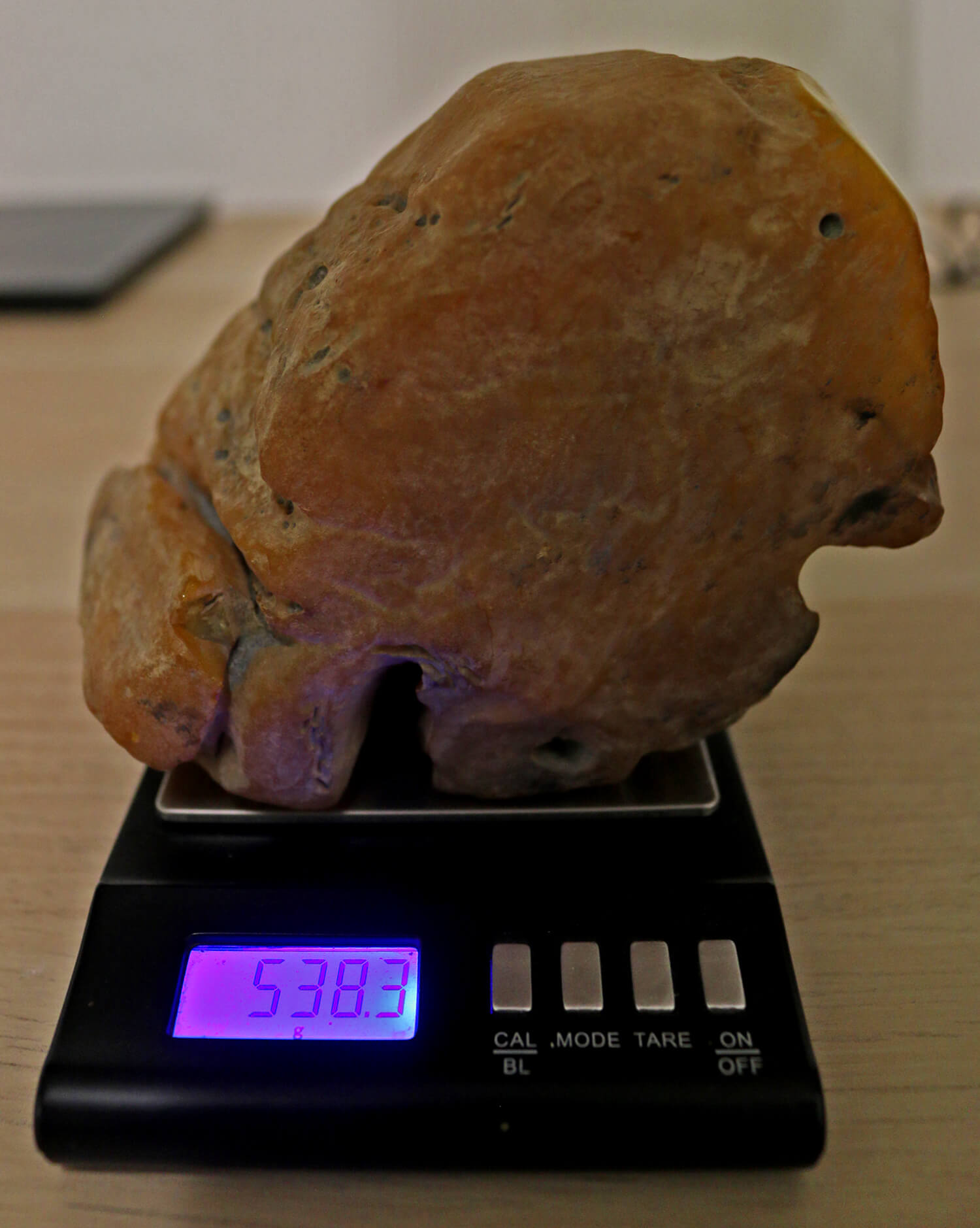 Full-size detail view of natural large amber piece, butterscotch Rovno Amber, easy to polish for premium Misbaha production