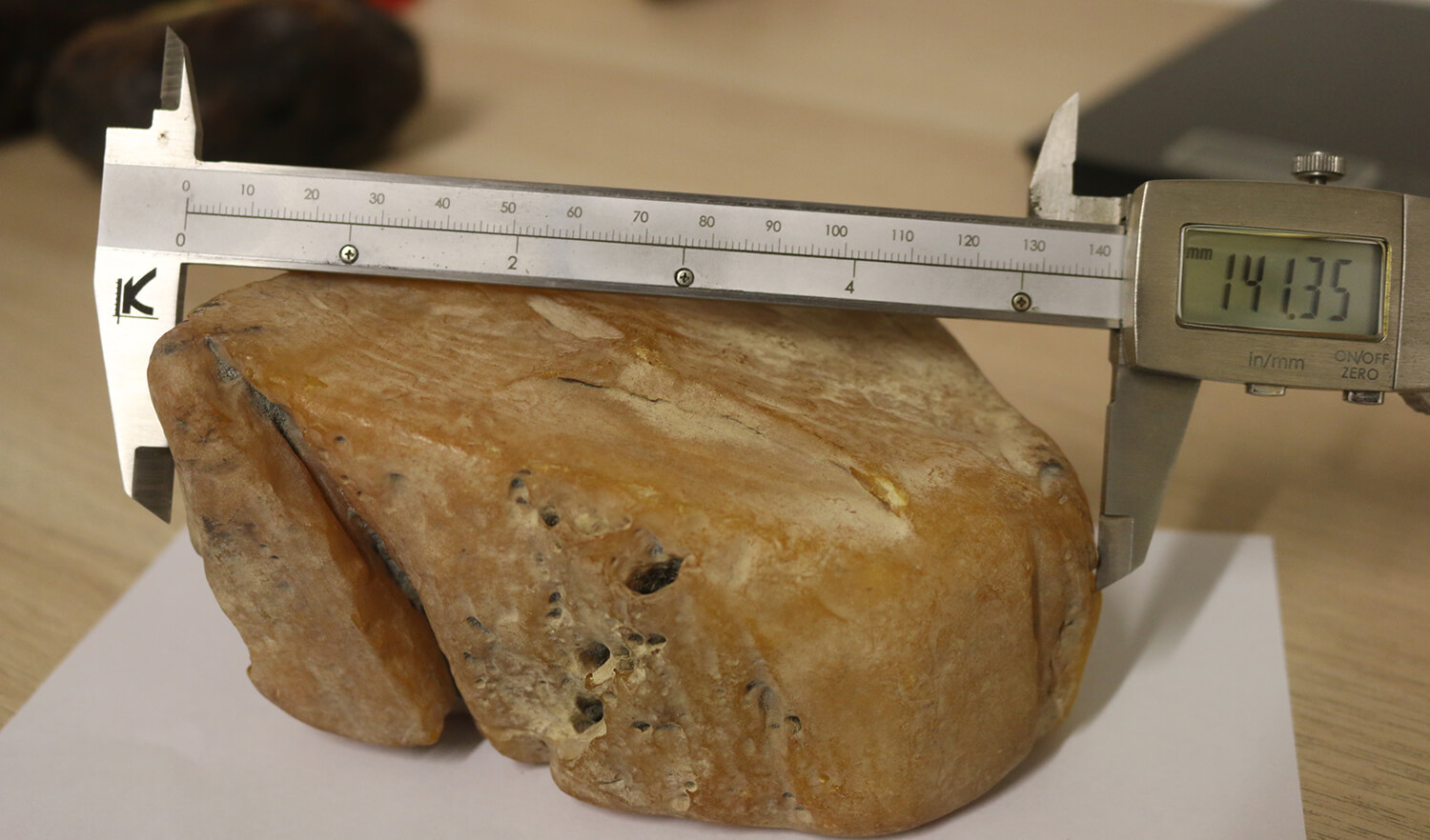 Full-size detail view of carving grade amber block, 538 gram, Ukrainian amber with uniform opaque texture for Tasbih beads